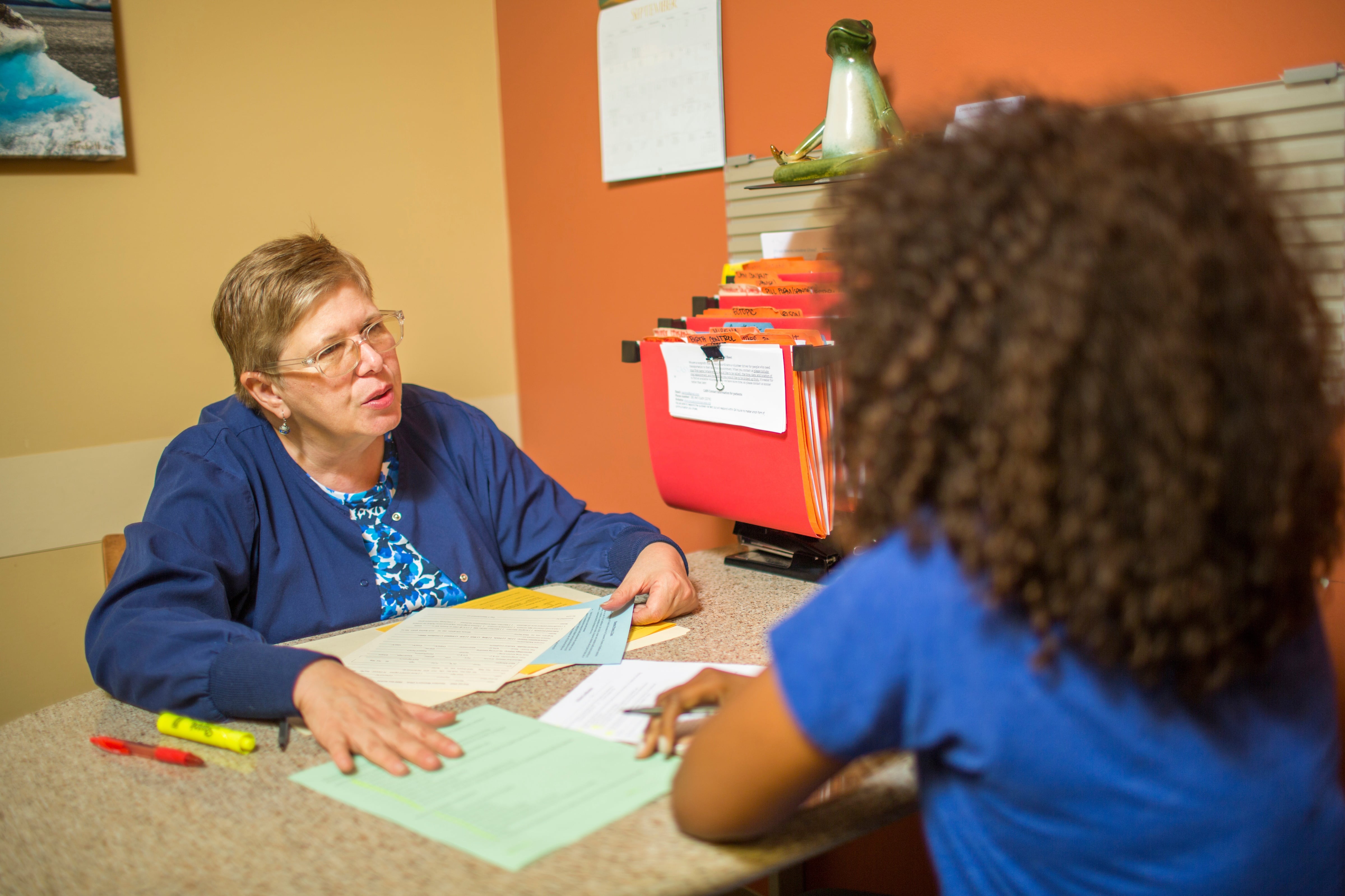 abortion counselor talks with patient about her options she has for her pregnancy